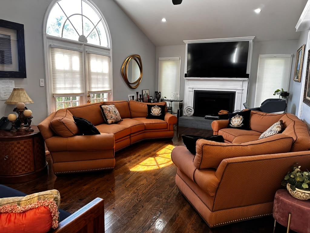Common living area with seating and a fireplace